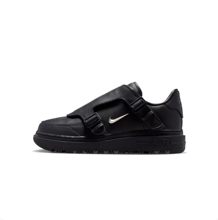 Nike Black Low-Top Sneakers with Buckled Shroud & Silver Swoosh