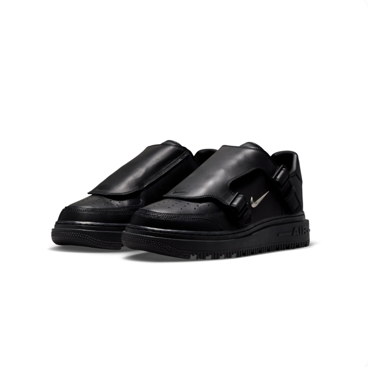 Nike Black Low-Top Sneakers with Buckled Shroud & Silver Swoosh