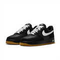 Nike Air Force 1 Black Sneakers with White Swoosh & Gum Sole