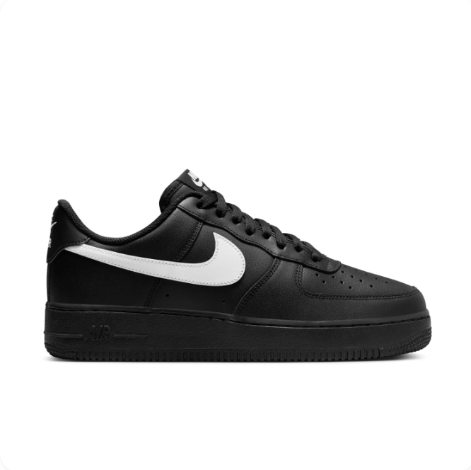 Nike Black Low-Top Sneakers with White Swoosh & Black Sole