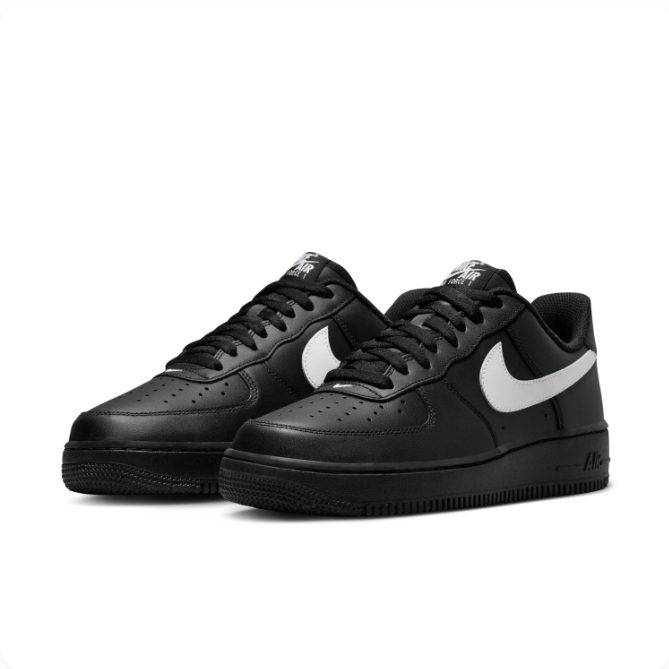 Nike Black Low-Top Sneakers with White Swoosh & Black Sole
