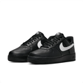 Nike Black Low-Top Sneakers with White Swoosh & Black Sole