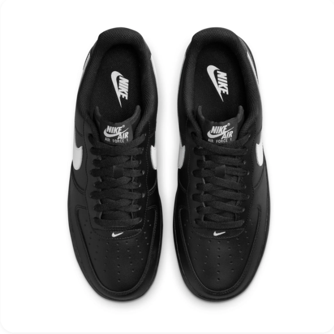 Nike Black Low-Top Sneakers with White Swoosh & Black Sole