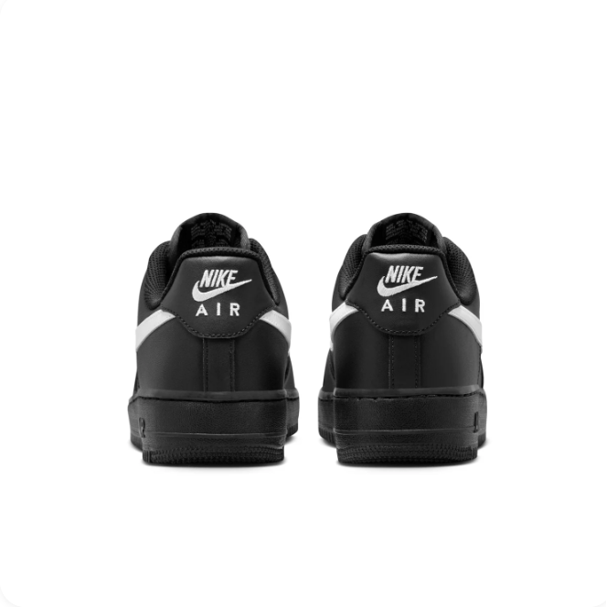 Nike Black Low-Top Sneakers with White Swoosh & Black Sole