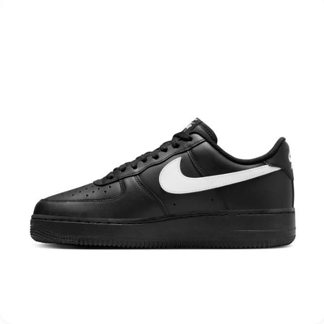Nike Black Low-Top Sneakers with White Swoosh & Black Sole